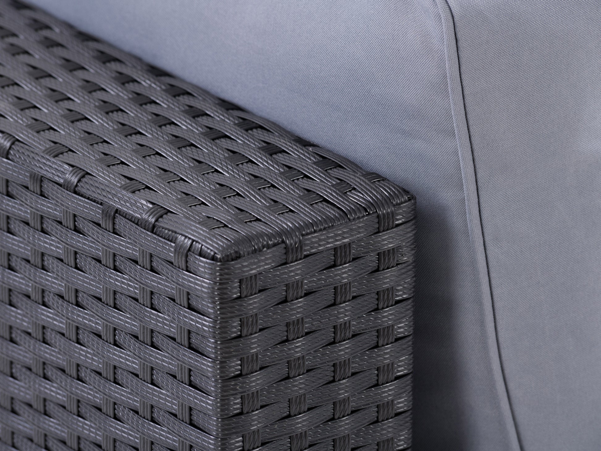Outdoor loveseat with beige cushions and dark brown wicker frame, featuring a durable and weather-resistant design, perfect for patio seating.