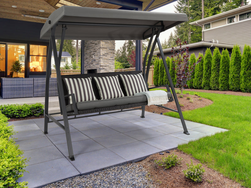 grey Patio Swing With Canopy Flora Collection lifestyle scene by CorLiving