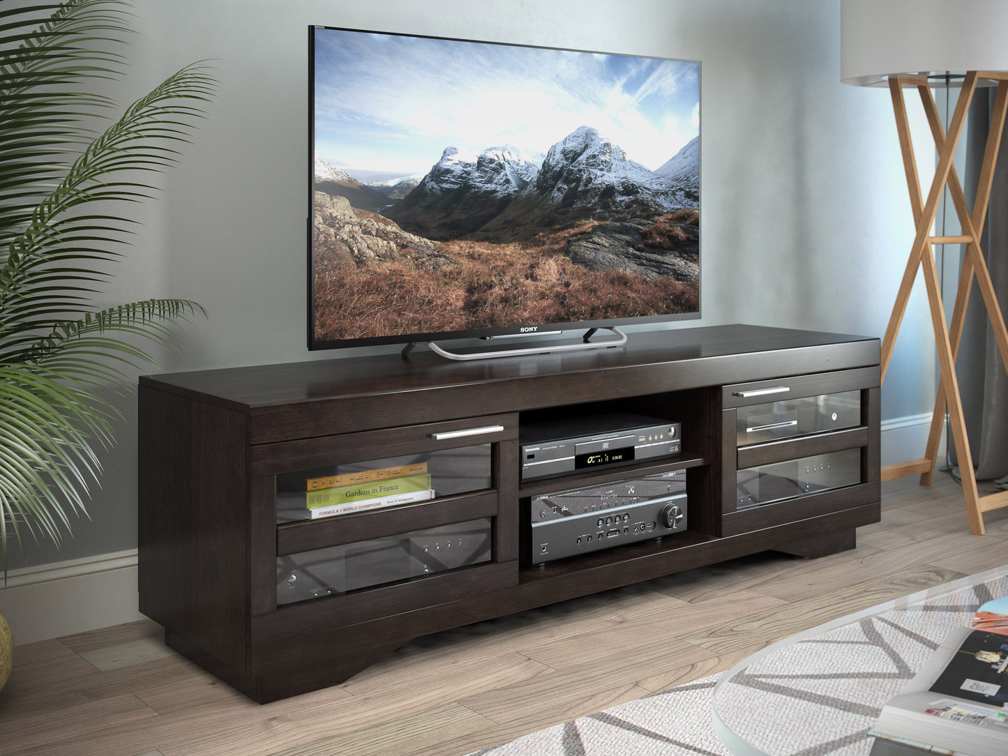 Modern TV stand for TVs up to 85 inches, featuring a sleek black finish with wood accents, spacious shelving, and cable management system, perfect for contemporary living rooms and media centers.