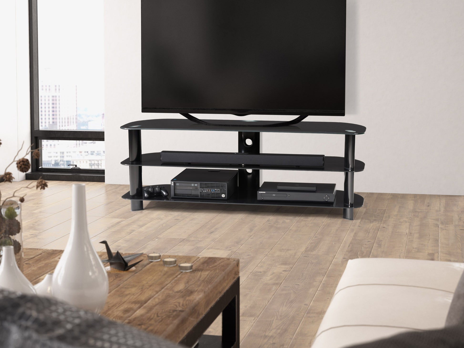 Modern TV stand with sleek black metal frame, natural wood shelves, and industrial design. Features open shelving for storage, cable management system, and sturdy construction. Ideal for contemporary living rooms.