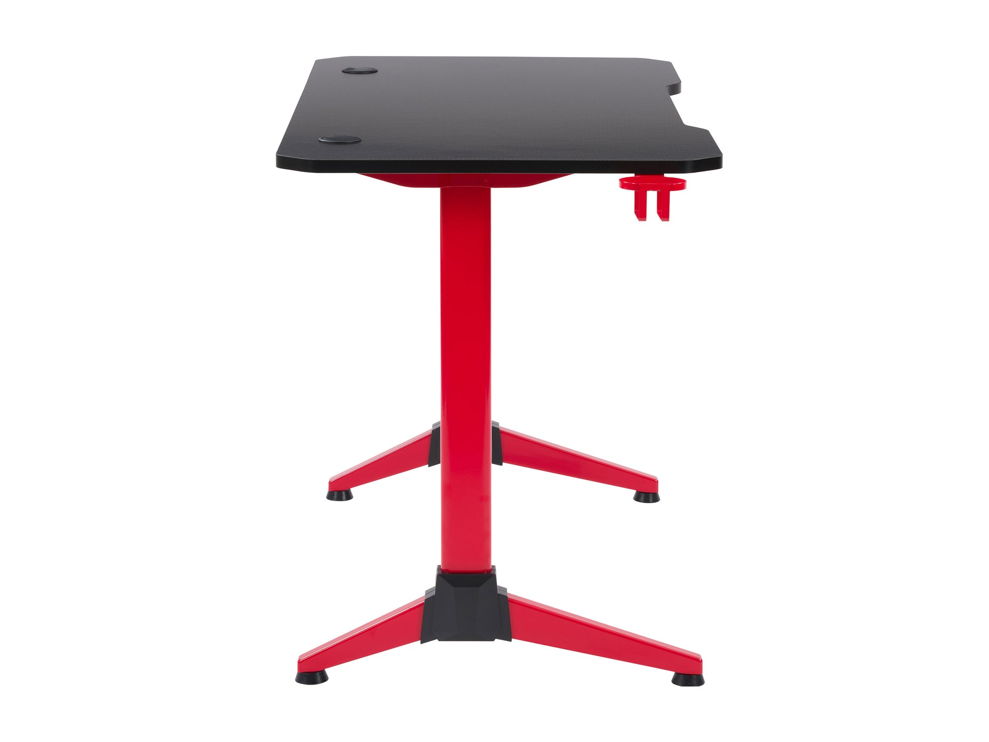 Red and black gaming desk with carbon fiber texture, built-in cup holder, headphone hook, and cable management grommets, featuring sturdy metal frame and spacious surface for monitors and gaming accessories.